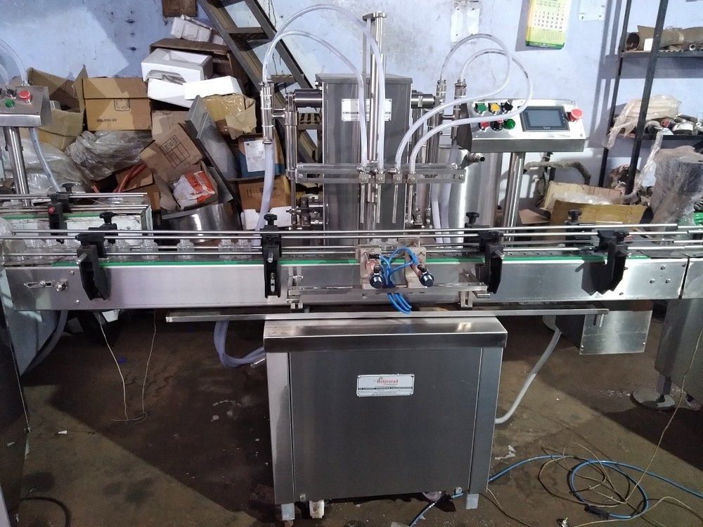 1000 ML. Electric 4 Head Oil Filling Machine, Capacity: 300 Bottle Per Hr