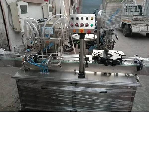 Automatic Liquid Filling And Cap Sealing Machines