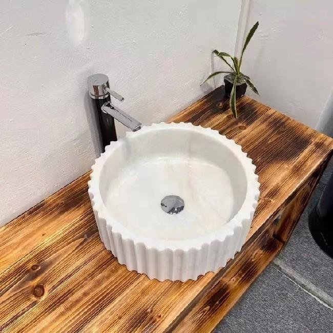 white marble counter basin