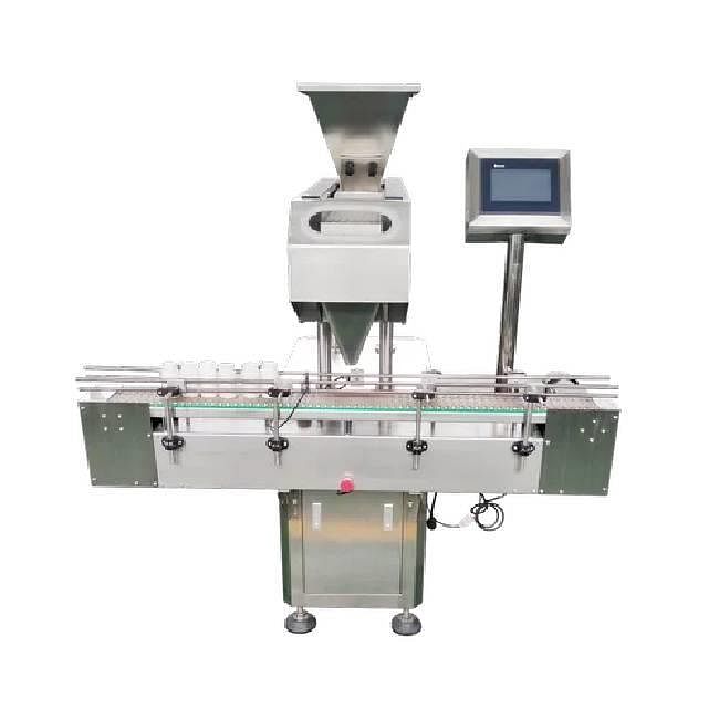 Tablet counting and filling machine