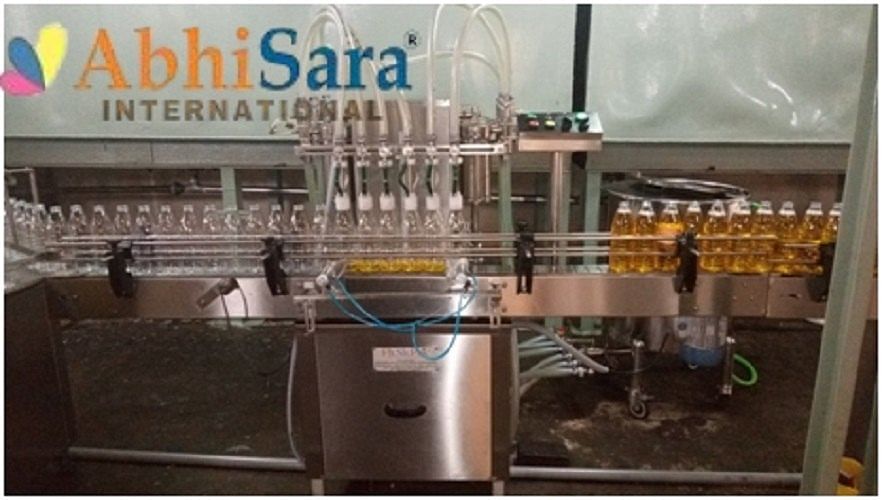 500 Ml To 5 Liter Electric Vegetable Oil Filling Machine, 4.5 Kw, Capacity: 10-20 Bpm