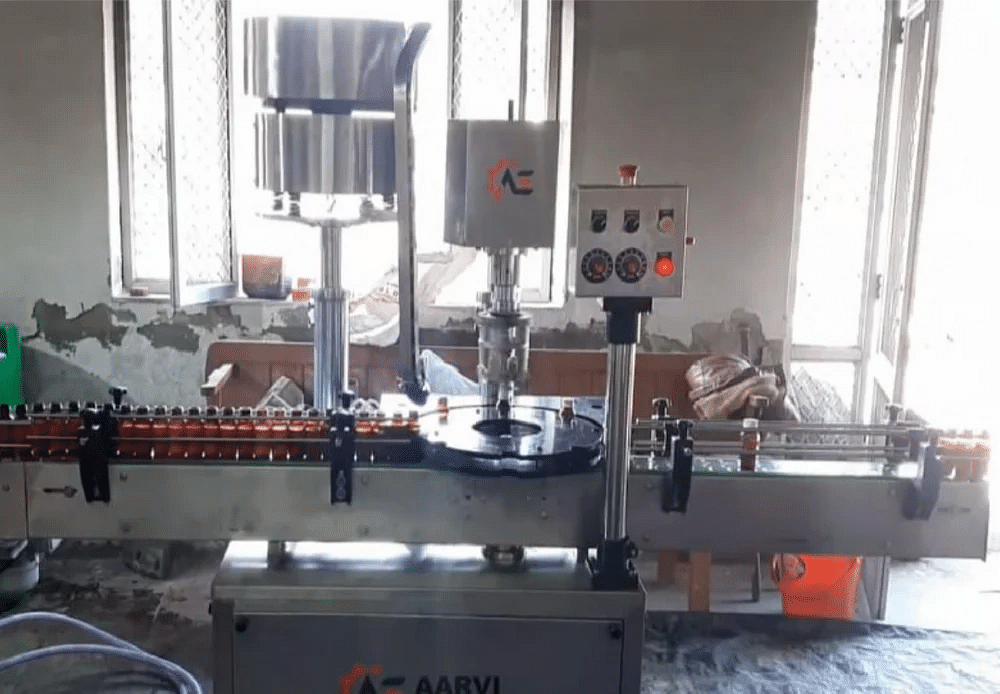 Aarvi Engineering Automatic Cap sealing Machine