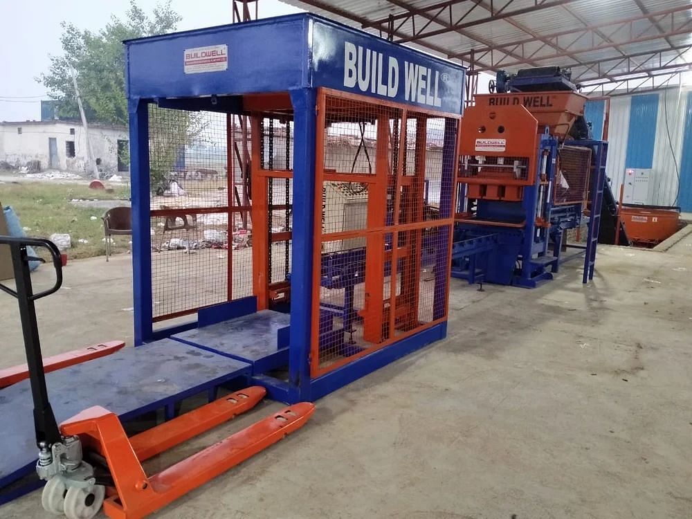 AUTOMATIC FLY ASH BRICK MACHINE WITH STACKER