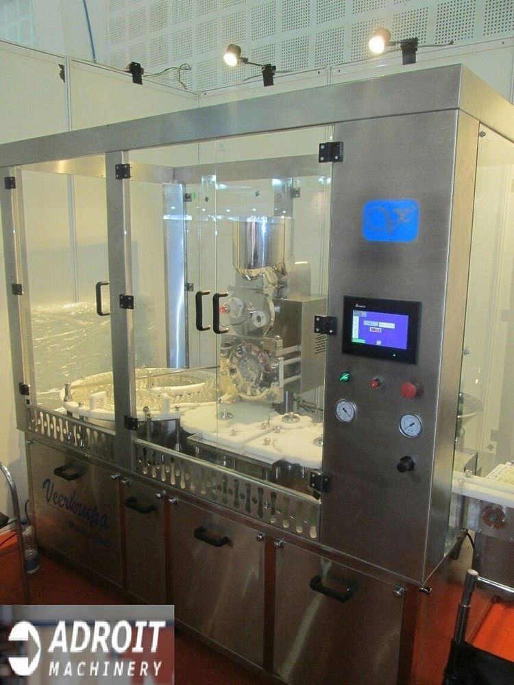 Automatic Injectable Dry Powder Filling Machine with rubber stoppering unit.