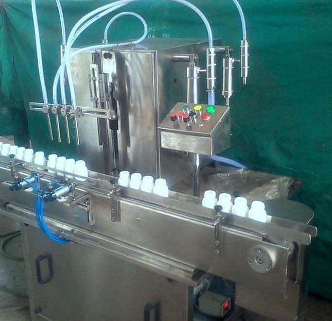 Automatic Oil Filling Machine, Capacity: 24 Bottle Per Minute