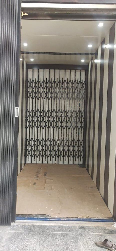 Black Mild Steel Elevator Collapsible Door, For Factory