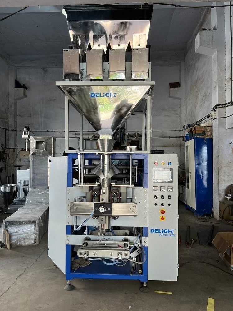 Four Head Weigh Base Granule Filling and packing Machine, Automatic, 7-8 hp