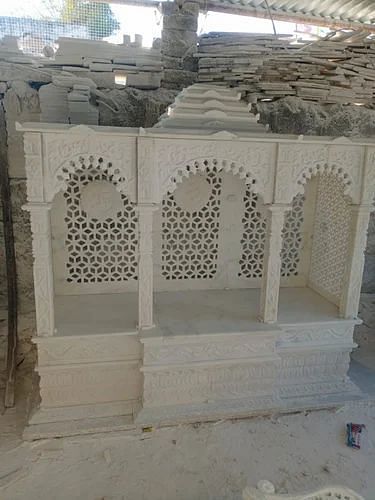 Marble home mandir, Design: Carving