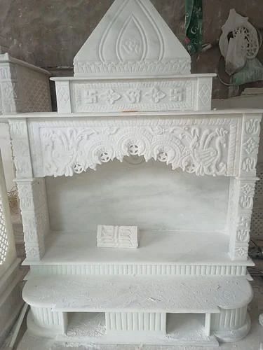 Marble home mandir, Design: Carving