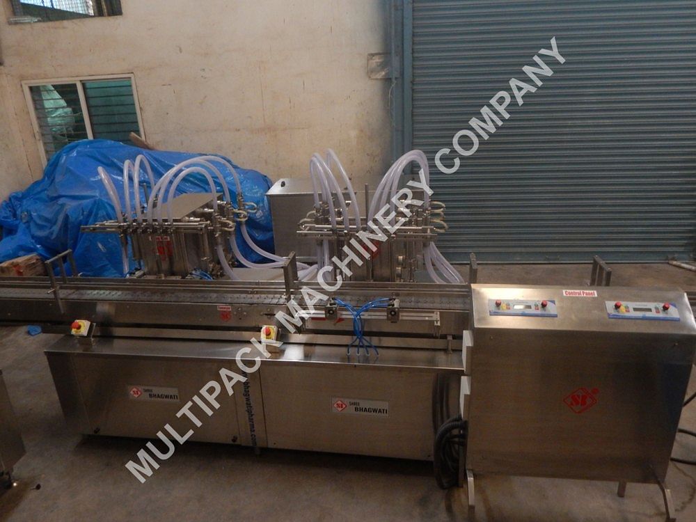 Multipack Machines Twelve Head Volumetric Liquid Bottle Filling Machine