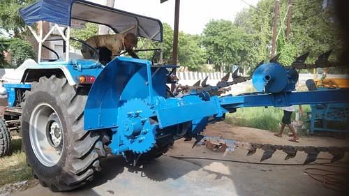 Tractor trencher machine