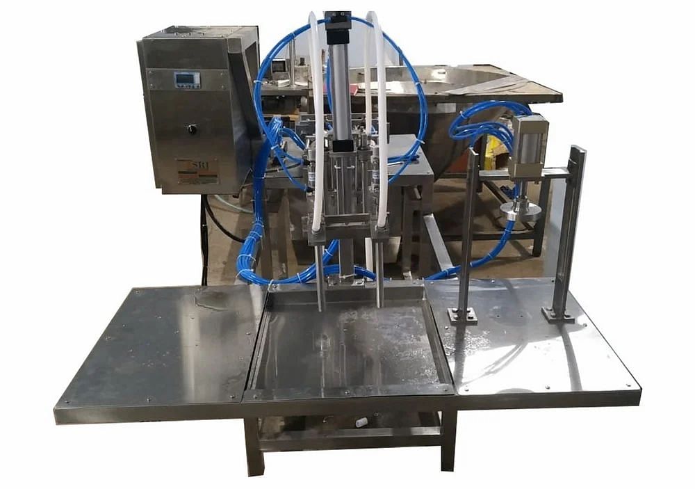 Two Head Volumetric Liquid Filling Machine, Capacity: 200 bottle/min